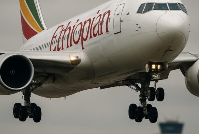 Ethiopian Airlines Boeing 767 with landing gear down approaching Geneva airport runway