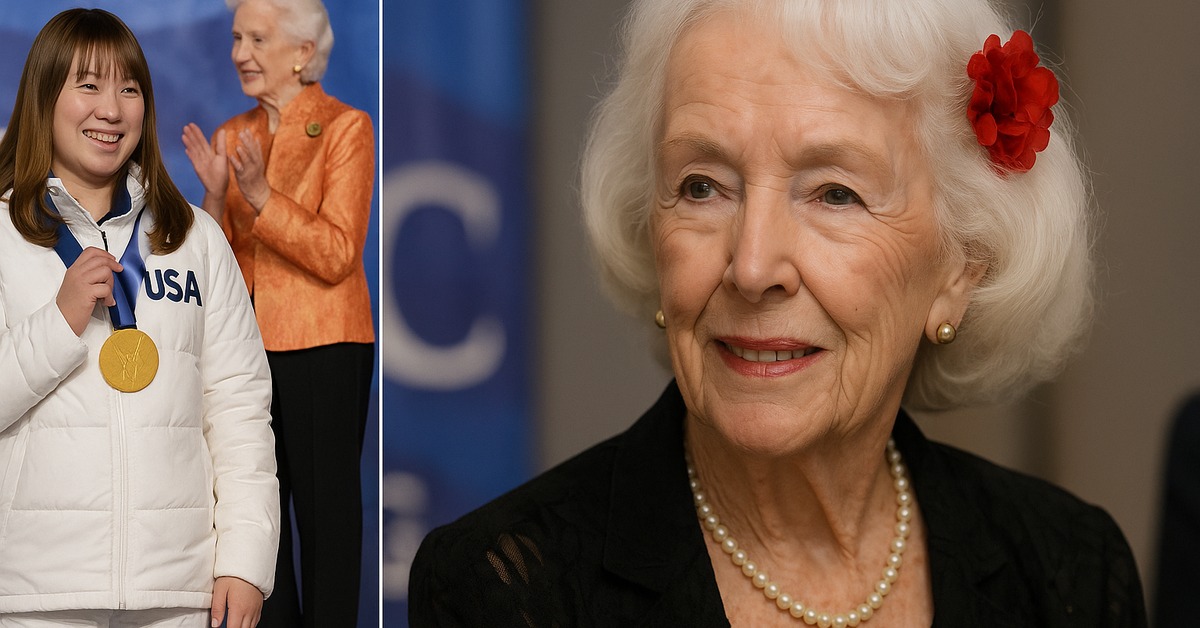 Elegant elderly woman with white hair and red flower smiles warmly in close portrait shot