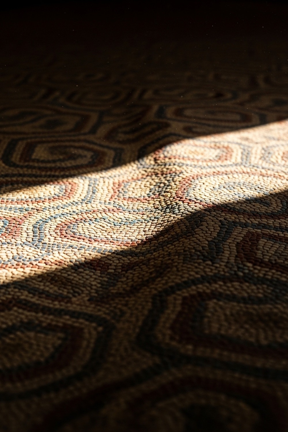 Ancient Roman mosaic floor with subtle seismic ripple visible across geometric marble tesserae