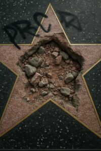 Trump's Hollywood Walk of Fame star smashed open, rubble and graffiti visible