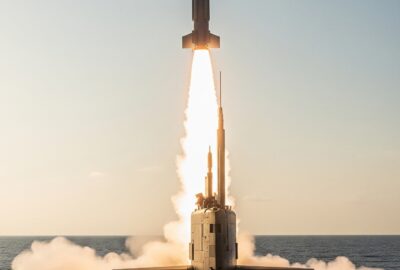 A Regulus I cruise missile launches from a submarine deck over open Atlantic waters