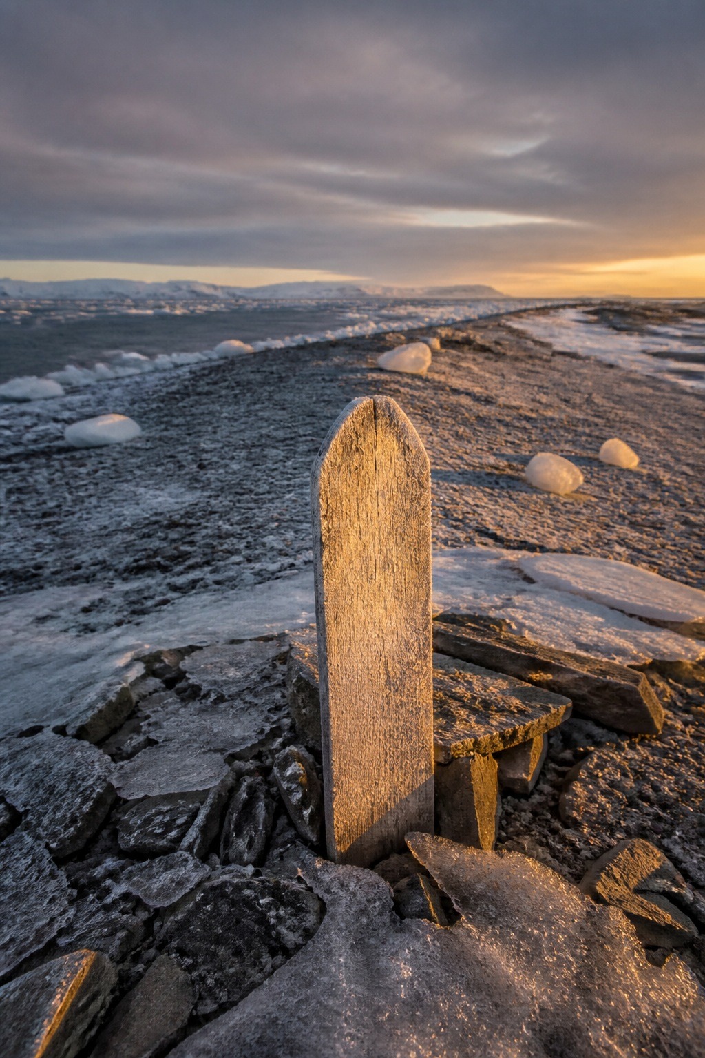 The frozen gravel of Beechey Island in the high Canadian Arctic, where three Franklin expedition sailors were buried in 1846