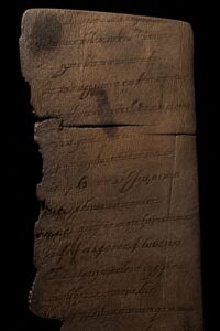 The vindolanda birthday invitation, a thin ink-on-wood Roman writing tablet showing Latin script in two different hands